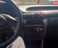 Красный Опель Астра, объемом двигателя 1.39 л и пробегом 370 тыс. км за 700 $, фото 3 на Automoto.ua