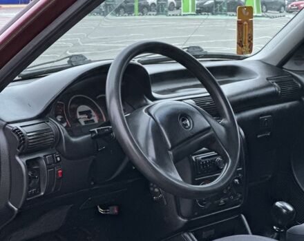 Красный Опель Астра, объемом двигателя 1.6 л и пробегом 400 тыс. км за 1299 $, фото 6 на Automoto.ua