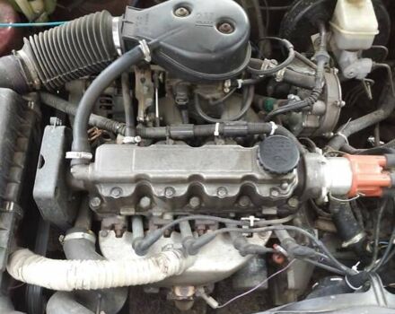 Червоний Опель Астра, об'ємом двигуна 1.4 л та пробігом 220 тис. км за 1800 $, фото 1 на Automoto.ua