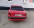 Красный Опель Астра, объемом двигателя 1.39 л и пробегом 300 тыс. км за 1700 $, фото 1 на Automoto.ua