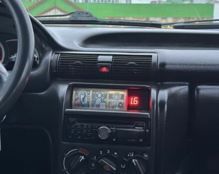 Красный Опель Астра, объемом двигателя 1.6 л и пробегом 400 тыс. км за 1299 $, фото 14 на Automoto.ua