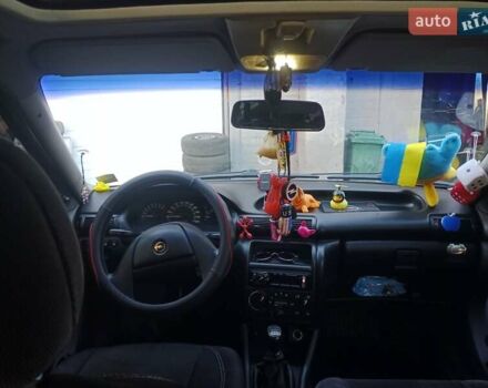 Червоний Опель Астра, об'ємом двигуна 1.6 л та пробігом 258 тис. км за 2000 $, фото 10 на Automoto.ua