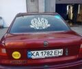 Червоний Опель Астра, об'ємом двигуна 1.6 л та пробігом 258 тис. км за 2000 $, фото 1 на Automoto.ua
