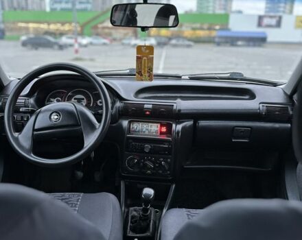 Красный Опель Астра, объемом двигателя 1.6 л и пробегом 400 тыс. км за 1299 $, фото 12 на Automoto.ua