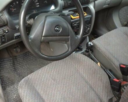 Червоний Опель Астра, об'ємом двигуна 1.4 л та пробігом 220 тис. км за 1800 $, фото 3 на Automoto.ua