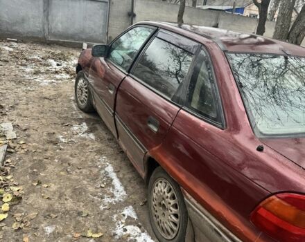 Красный Опель Астра, объемом двигателя 1.6 л и пробегом 492 тыс. км за 600 $, фото 5 на Automoto.ua