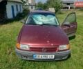 Красный Опель Астра, объемом двигателя 1.39 л и пробегом 370 тыс. км за 700 $, фото 1 на Automoto.ua
