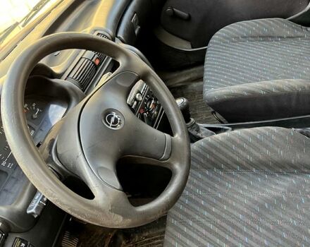 Червоний Опель Астра, об'ємом двигуна 1.4 л та пробігом 230 тис. км за 1000 $, фото 3 на Automoto.ua