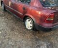 Красный Опель Астра, объемом двигателя 1.7 л и пробегом 300 тыс. км за 3000 $, фото 1 на Automoto.ua
