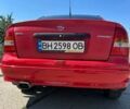 Красный Опель Астра, объемом двигателя 1.4 л и пробегом 283 тыс. км за 3200 $, фото 12 на Automoto.ua