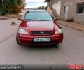 Красный Опель Астра, объемом двигателя 1.6 л и пробегом 280 тыс. км за 2850 $, фото 1 на Automoto.ua