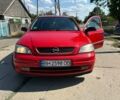 Красный Опель Астра, объемом двигателя 1.4 л и пробегом 283 тыс. км за 3200 $, фото 2 на Automoto.ua