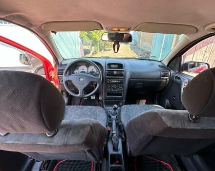 Красный Опель Астра, объемом двигателя 1.4 л и пробегом 283 тыс. км за 3200 $, фото 16 на Automoto.ua