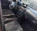Красный Опель Астра, объемом двигателя 1.6 л и пробегом 245 тыс. км за 1350 $, фото 1 на Automoto.ua