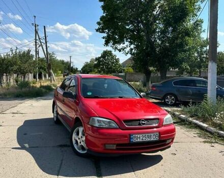 Красный Опель Астра, объемом двигателя 1.4 л и пробегом 283 тыс. км за 3200 $, фото 10 на Automoto.ua