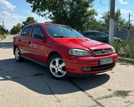 Красный Опель Астра, объемом двигателя 1.4 л и пробегом 283 тыс. км за 3200 $, фото 9 на Automoto.ua