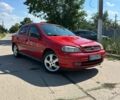 Красный Опель Астра, объемом двигателя 1.4 л и пробегом 283 тыс. км за 3200 $, фото 9 на Automoto.ua