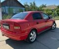Красный Опель Астра, объемом двигателя 1.4 л и пробегом 283 тыс. км за 3200 $, фото 1 на Automoto.ua