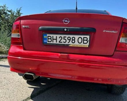 Красный Опель Астра, объемом двигателя 1.4 л и пробегом 283 тыс. км за 3200 $, фото 3 на Automoto.ua