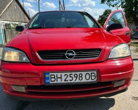 Красный Опель Астра, объемом двигателя 1.4 л и пробегом 283 тыс. км за 3200 $, фото 6 на Automoto.ua