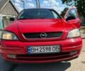 Красный Опель Астра, объемом двигателя 1.4 л и пробегом 283 тыс. км за 3200 $, фото 6 на Automoto.ua