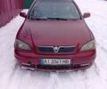 Красный Опель Астра, объемом двигателя 1.6 л и пробегом 270 тыс. км за 2500 $, фото 1 на Automoto.ua
