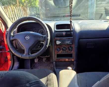 Красный Опель Астра, объемом двигателя 1.8 л и пробегом 170 тыс. км за 2280 $, фото 2 на Automoto.ua