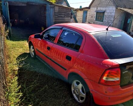 Красный Опель Астра, объемом двигателя 1.8 л и пробегом 170 тыс. км за 2280 $, фото 4 на Automoto.ua