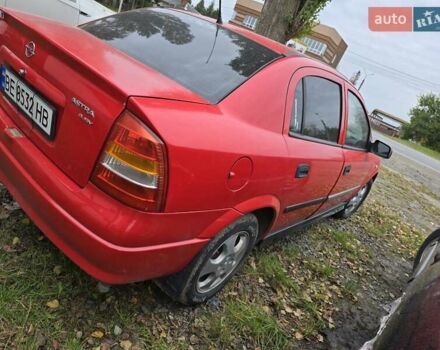 Красный Опель Астра, объемом двигателя 1.6 л и пробегом 345 тыс. км за 2990 $, фото 2 на Automoto.ua