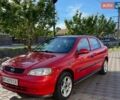 Красный Опель Астра, объемом двигателя 1.6 л и пробегом 160 тыс. км за 3000 $, фото 1 на Automoto.ua