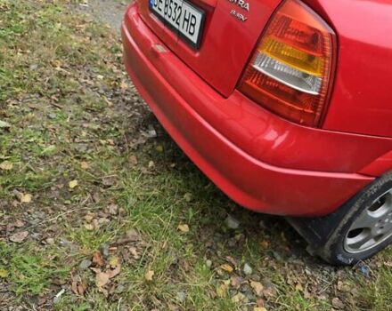 Красный Опель Астра, объемом двигателя 1.6 л и пробегом 345 тыс. км за 2990 $, фото 6 на Automoto.ua