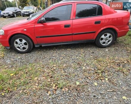 Красный Опель Астра, объемом двигателя 1.6 л и пробегом 345 тыс. км за 2990 $, фото 3 на Automoto.ua