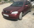 Красный Опель Астра, объемом двигателя 1.39 л и пробегом 290 тыс. км за 2400 $, фото 1 на Automoto.ua