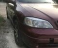 Красный Опель Астра, объемом двигателя 1.39 л и пробегом 290 тыс. км за 2400 $, фото 3 на Automoto.ua