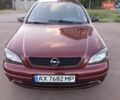 Красный Опель Астра, объемом двигателя 2 л и пробегом 231 тыс. км за 3800 $, фото 1 на Automoto.ua