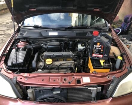 Червоний Опель Астра, об'ємом двигуна 1.6 л та пробігом 177 тис. км за 3800 $, фото 5 на Automoto.ua