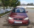 Червоний Опель Астра, об'ємом двигуна 1.4 л та пробігом 210 тис. км за 3400 $, фото 1 на Automoto.ua