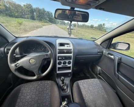 Красный Опель Астра, объемом двигателя 2 л и пробегом 300 тыс. км за 1250 $, фото 6 на Automoto.ua