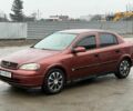 Красный Опель Астра, объемом двигателя 1.8 л и пробегом 300 тыс. км за 3500 $, фото 1 на Automoto.ua