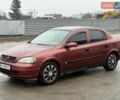 Красный Опель Астра, объемом двигателя 1.8 л и пробегом 300 тыс. км за 3500 $, фото 1 на Automoto.ua