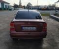 Красный Опель Астра, объемом двигателя 1.4 л и пробегом 210 тыс. км за 3400 $, фото 4 на Automoto.ua