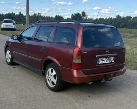 Красный Опель Астра, объемом двигателя 2 л и пробегом 300 тыс. км за 1250 $, фото 4 на Automoto.ua