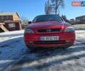 Красный Опель Астра, объемом двигателя 1.6 л и пробегом 300 тыс. км за 2500 $, фото 1 на Automoto.ua