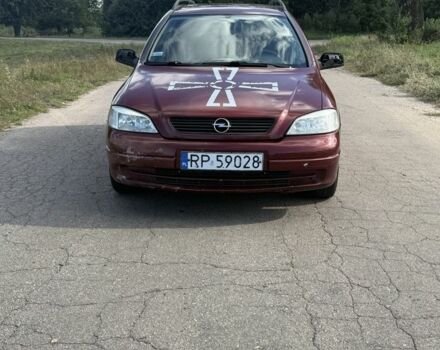 Красный Опель Астра, объемом двигателя 2 л и пробегом 300 тыс. км за 1250 $, фото 1 на Automoto.ua