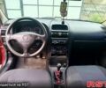 Красный Опель Астра, объемом двигателя 1.6 л и пробегом 251 тыс. км за 3000 $, фото 5 на Automoto.ua