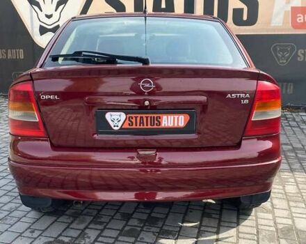 Красный Опель Астра, объемом двигателя 1.6 л и пробегом 218 тыс. км за 3900 $, фото 7 на Automoto.ua
