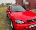 Красный Опель Астра, объемом двигателя 1.8 л и пробегом 320 тыс. км за 3100 $, фото 1 на Automoto.ua