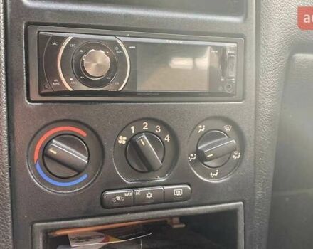 Красный Опель Астра, объемом двигателя 1.6 л и пробегом 218 тыс. км за 3900 $, фото 13 на Automoto.ua