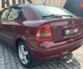 Красный Опель Астра, объемом двигателя 1.6 л и пробегом 218 тыс. км за 3900 $, фото 6 на Automoto.ua