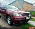 Красный Опель Астра, объемом двигателя 1.6 л и пробегом 251 тыс. км за 3000 $, фото 1 на Automoto.ua